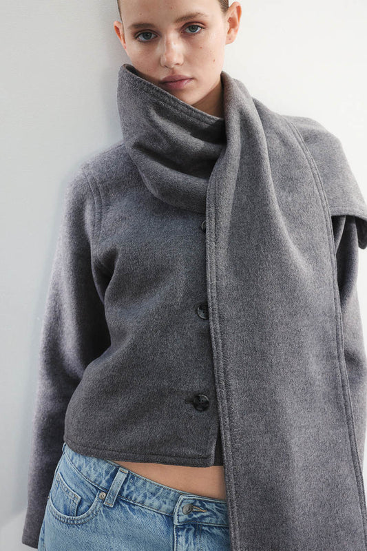 Wear a scarf and a felt jacket